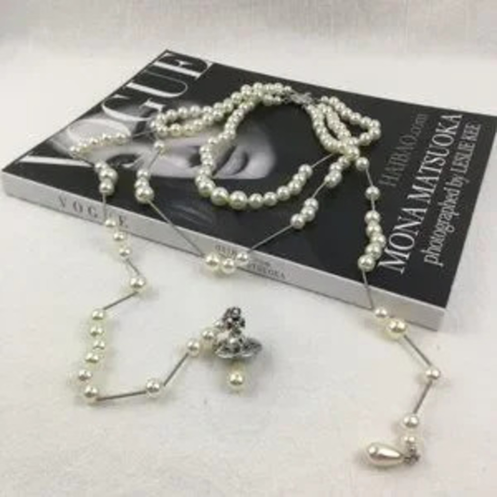 Vivienne Westwood Irregular Three Row Pearl Bas Relief Choker in Silver